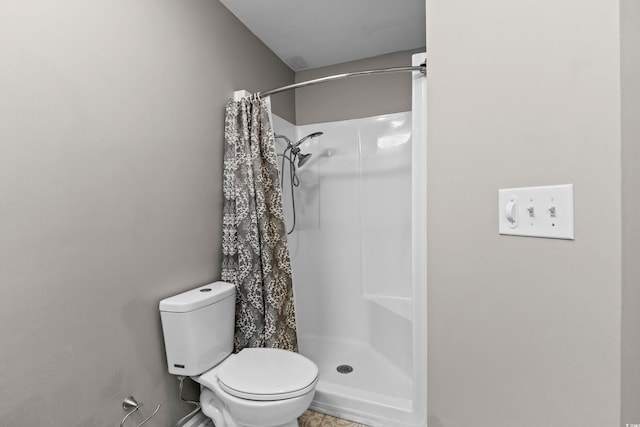 1356 Glenns Bay Rd Unit A202, Surfside Beach, SC 29575 - bathroom featuring toilet and a shower with shower curtain