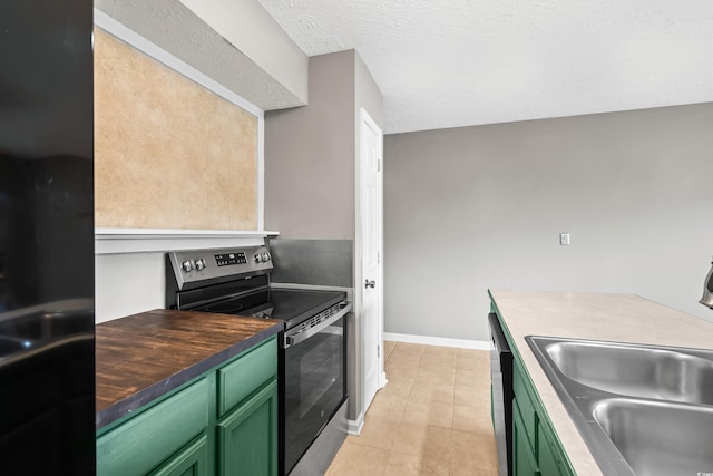 4101 Pinehurst Cir Unit Aa-3, Little River, SC 29566 - kitchen featuring green cabinets, electric stove, a sink, light tile patterned flooring, and dishwasher