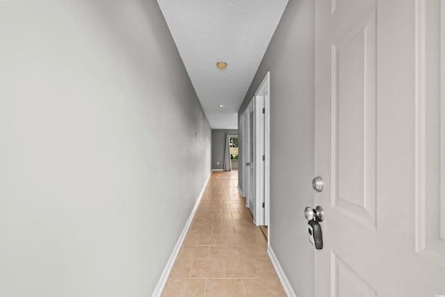 4101 Pinehurst Cir Unit Aa-3, Little River, SC 29566 - hall featuring light tile patterned flooring and baseboards