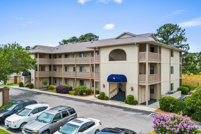4101 Pinehurst Cir Unit Aa-3, Little River, SC 29566 - view of property featuring uncovered parking