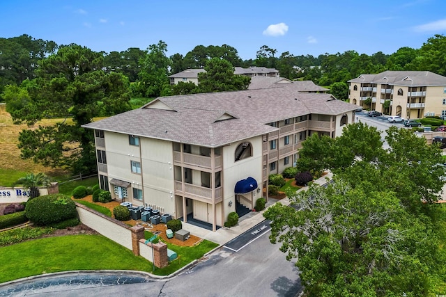 4101 Pinehurst Cir Unit Aa-3, Little River, SC 29566 - view of building exterior featuring view of wooded area