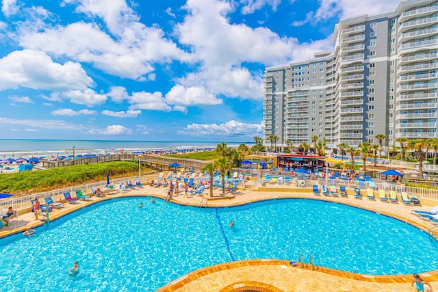 161 Sea Watch Dr Unit 601, Myrtle Beach, SC 29572 - community pool with a water view and a patio