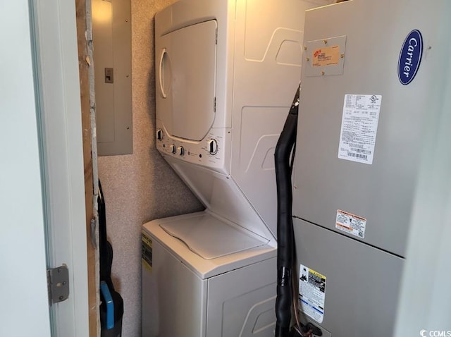 161 Sea Watch Dr Unit 601, Myrtle Beach, SC 29572 - washroom featuring stacked washer / dryer and electric panel