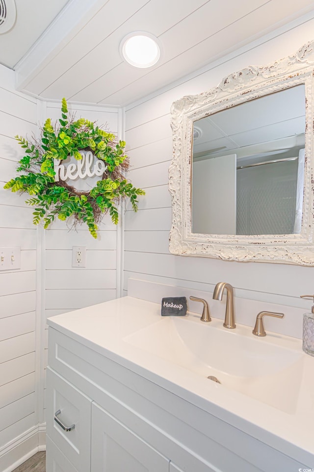 161 Sea Watch Dr Unit 601, Myrtle Beach, SC 29572 - bathroom with vanity and wooden walls
