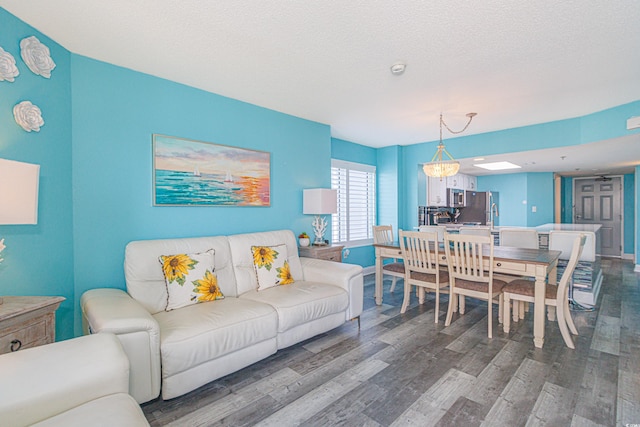 161 Sea Watch Dr Unit 601, Myrtle Beach, SC 29572 - living room with wood finished floors and baseboards