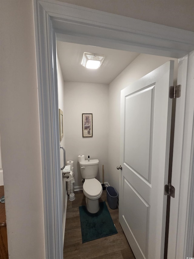 297 Harvest Ridge Way, Conway, SC 29527 - bathroom with wood finished floors, toilet, and baseboards