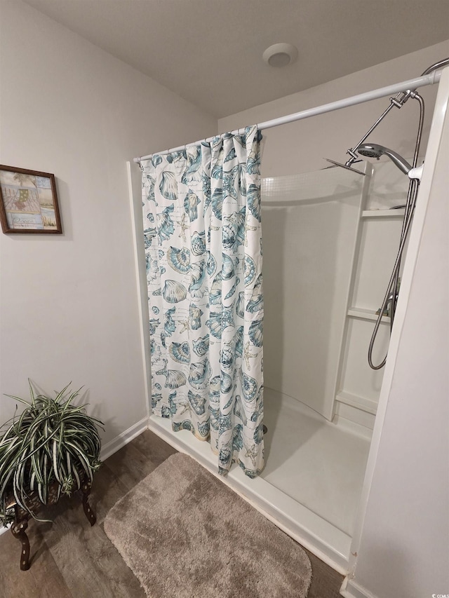 297 Harvest Ridge Way, Conway, SC 29527 - full bath featuring curtained shower, baseboards, and wood finished floors