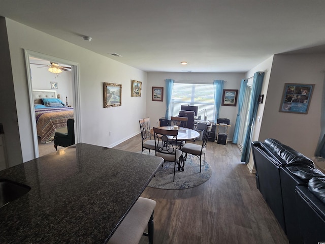 297 Harvest Ridge Way, Conway, SC 29527 - dining space featuring dark wood finished floors, an office area, ceiling fan, and baseboards