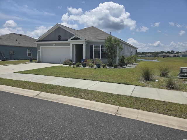297 Harvest Ridge Way, Conway, SC 29527 - view of front of house featuring an attached garage, driveway, and a front yard