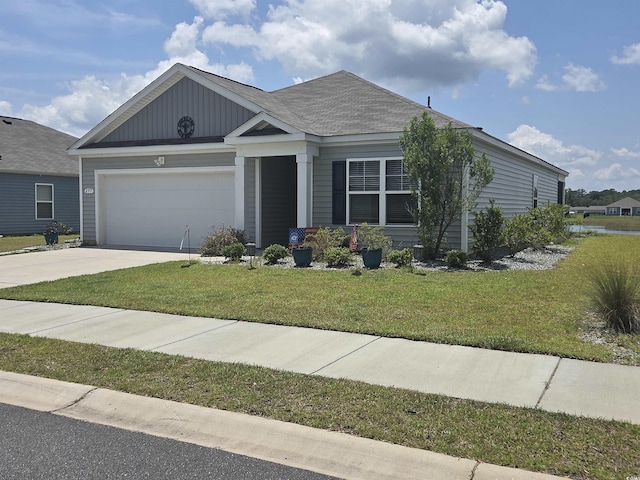 297 Harvest Ridge Way, Conway, SC 29527 - view of front of house featuring a garage, driveway, and a front lawn