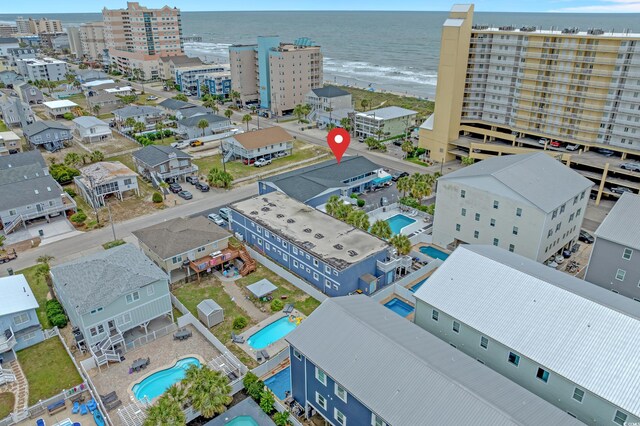 5409 N Ocean Blvd Unit 100, North Myrtle Beach, SC 29582 - view of urban area with a pool area and a nearby body of water