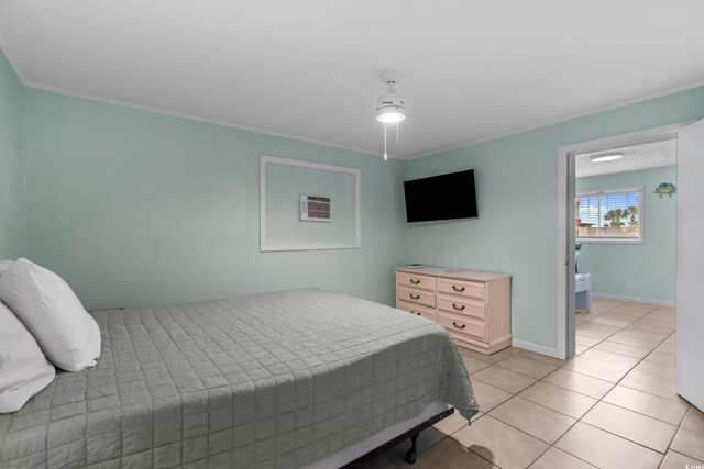 5409 N Ocean Blvd Unit 100, North Myrtle Beach, SC 29582 - bedroom with light tile patterned flooring, baseboards, and ornamental molding