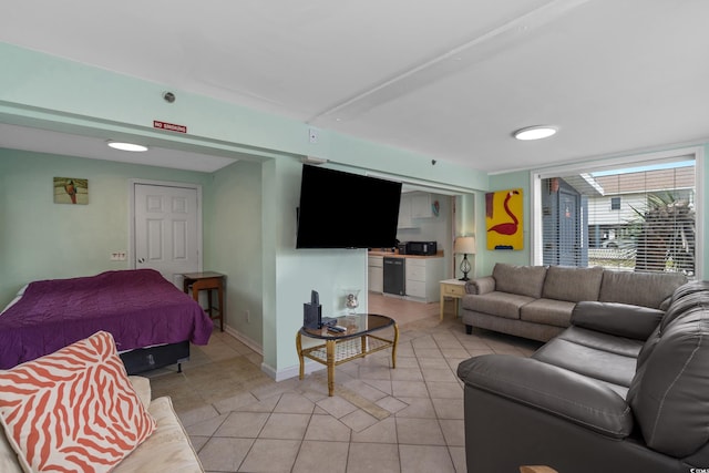 5409 N Ocean Blvd Unit 100, North Myrtle Beach, SC 29582 - living room with light tile patterned floors and baseboards