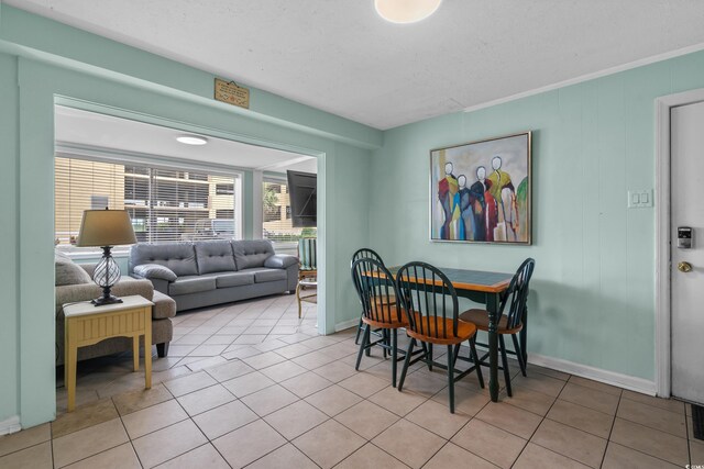 5409 N Ocean Blvd Unit 100, North Myrtle Beach, SC 29582 - tiled dining space with baseboards