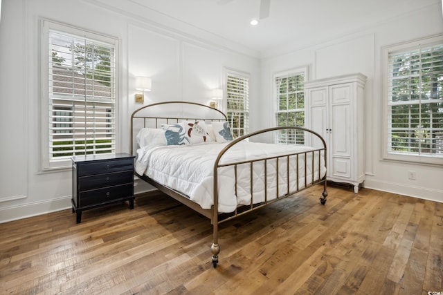 346 Tuckers Rd Unit A, Pawleys Island, SC 29585 - bedroom featuring multiple windows, baseboards, and crown molding