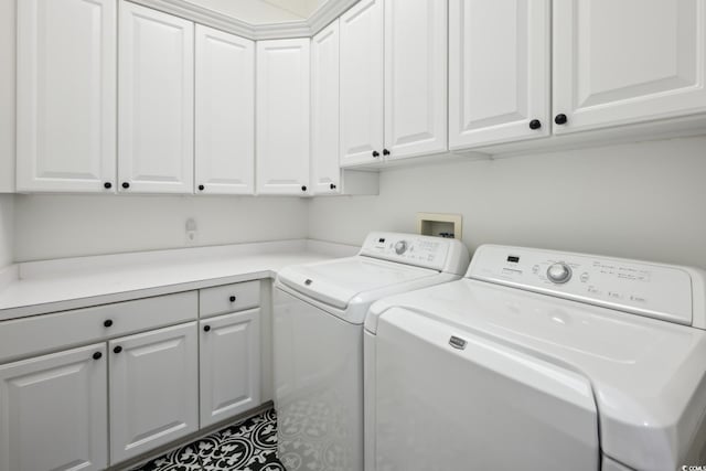 346 Tuckers Rd Unit A, Pawleys Island, SC 29585 - laundry room with washer and dryer and cabinet space