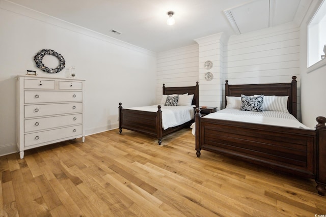 346 Tuckers Rd Unit A, Pawleys Island, SC 29585 - bedroom featuring light wood-style floors and ornamental molding