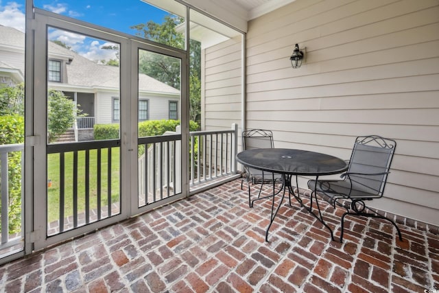 346 Tuckers Rd Unit A, Pawleys Island, SC 29585 - sunroom / solarium with outdoor dining area