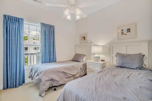 6015 Catalina Dr Unit 732, North Myrtle Beach, SC 29582 - carpeted bedroom with multiple windows and a ceiling fan
