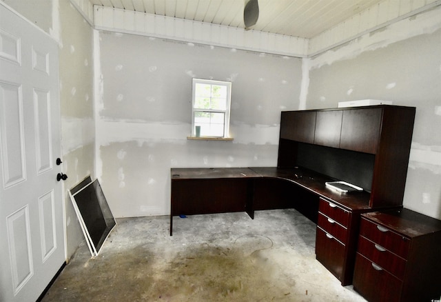 126 Clovis Cir, Myrtle Beach, SC 29579 - office area featuring built in desk, unfinished concrete floors, and wood ceiling