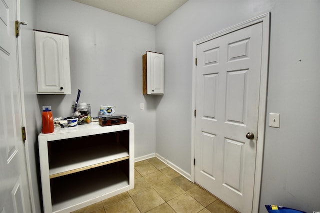 126 Clovis Cir, Myrtle Beach, SC 29579 - laundry room with baseboards and light tile patterned floors