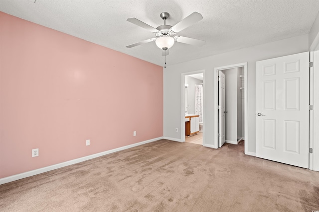 820 Fairway Dr Unit 1502Hh, Longs, SC 29568 - unfurnished bedroom featuring light colored carpet, a textured ceiling, ensuite bath, ceiling fan, and a spacious closet