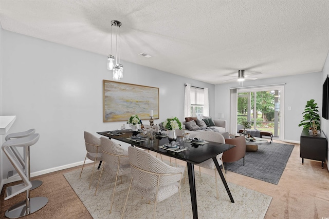 820 Fairway Dr Unit 1502Hh, Longs, SC 29568 - dining room with light carpet, a textured ceiling, and ceiling fan