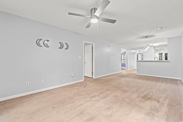 820 Fairway Dr Unit 1502Hh, Longs, SC 29568 - unfurnished living room featuring a ceiling fan and light colored carpet