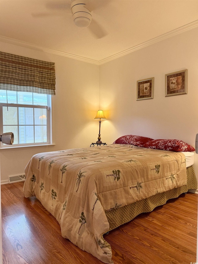 216 Walden Lake Rd, Conway, SC 29526 - bedroom featuring wood finished floors, crown molding, and a ceiling fan