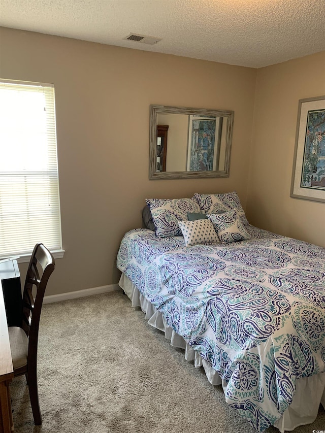 1432 Seahouse Ct, Surfside Beach, SC 29575 - carpeted bedroom with a textured ceiling