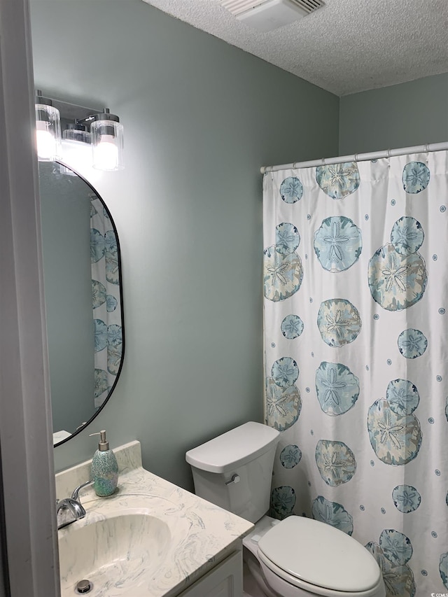 1432 Seahouse Ct, Surfside Beach, SC 29575 - full bath featuring a textured ceiling, vanity, and curtained shower