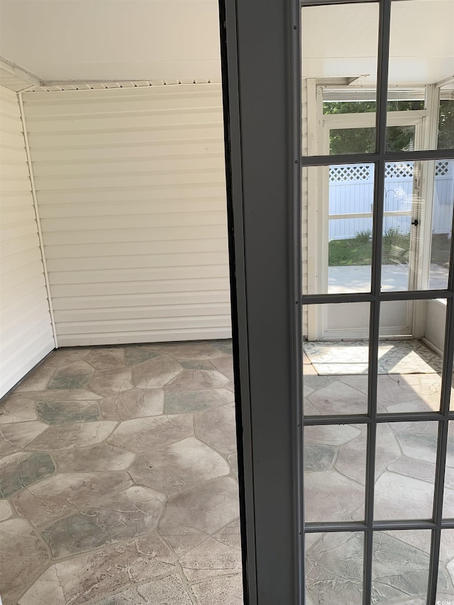 1432 Seahouse Ct, Surfside Beach, SC 29575 - doorway to outside featuring stone finish flooring
