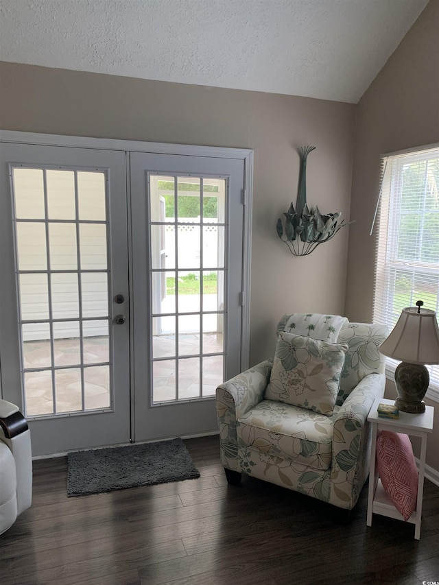 1432 Seahouse Ct, Surfside Beach, SC 29575 - doorway featuring vaulted ceiling, french doors, wood finished floors, and a textured ceiling