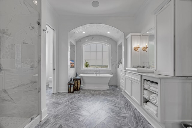191 Grackle Ln, Pawleys Island, SC 29585 - full bathroom with vanity, marble finish flooring, a marble finish shower, a soaking tub, and ornamental molding