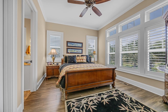 191 Grackle Ln, Pawleys Island, SC 29585 - bedroom featuring ornamental molding, wood finished floors, baseboards, and a ceiling fan