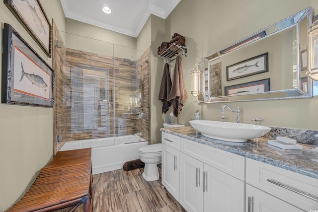191 Grackle Ln, Pawleys Island, SC 29585 - bathroom featuring crown molding, vanity, toilet, enclosed tub / shower combo, and recessed lighting