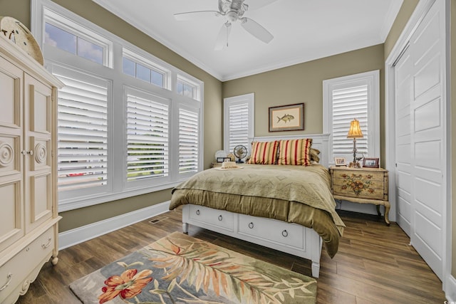 191 Grackle Ln, Pawleys Island, SC 29585 - bedroom featuring crown molding, dark wood-type flooring, and a ceiling fan