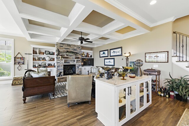 191 Grackle Ln, Pawleys Island, SC 29585 - living room with ceiling fan, stairs, dark wood-style floors, a fireplace, and beamed ceiling