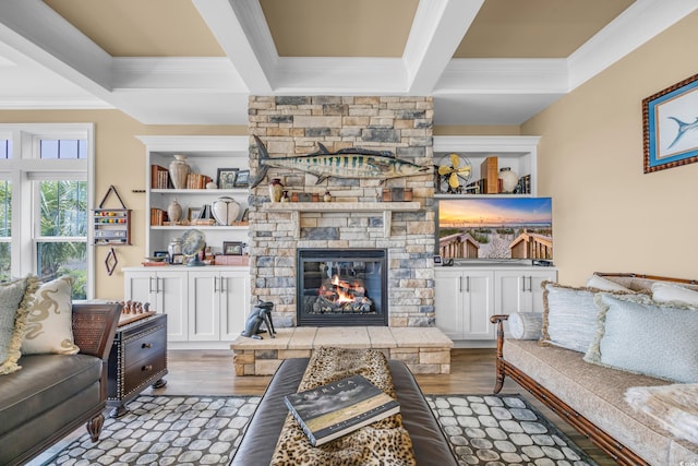 191 Grackle Ln, Pawleys Island, SC 29585 - living area featuring ornamental molding, a stone fireplace, wood finished floors, and beam ceiling