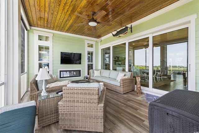 191 Grackle Ln, Pawleys Island, SC 29585 - sunroom with ceiling fan and an outdoor hangout area