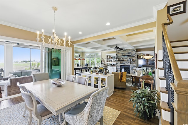 191 Grackle Ln, Pawleys Island, SC 29585 - dining space featuring crown molding, a chandelier, coffered ceiling, ceiling fan, and dark wood-style flooring