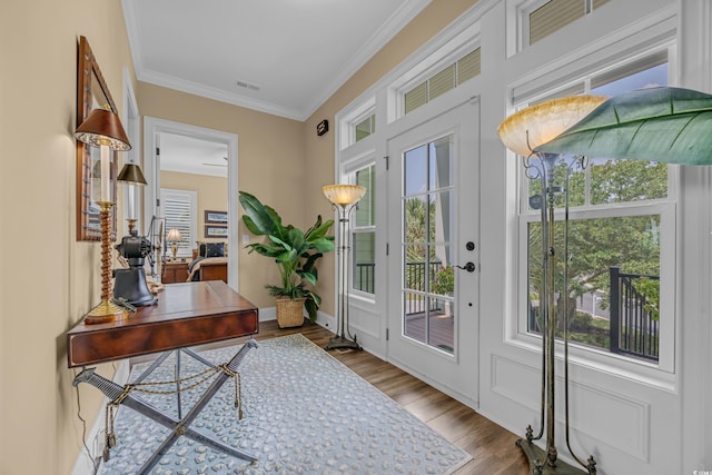 191 Grackle Ln, Pawleys Island, SC 29585 - doorway featuring a desk, crown molding, and wood finished floors