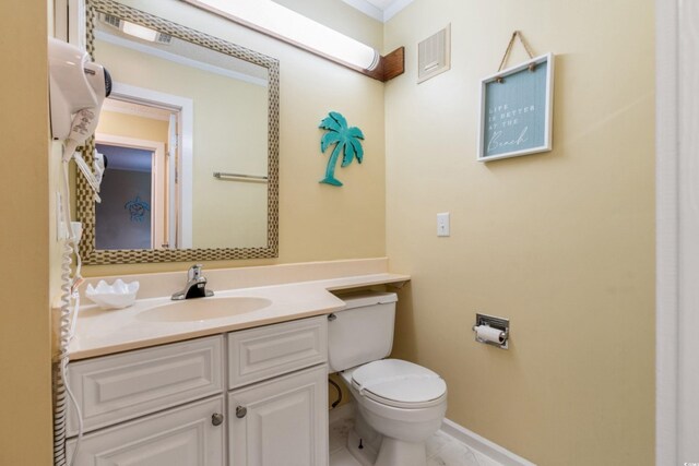 415 Ocean Creek Dr Unit 2372, Myrtle Beach, SC 29572 - half bathroom with vanity, toilet, and baseboards
