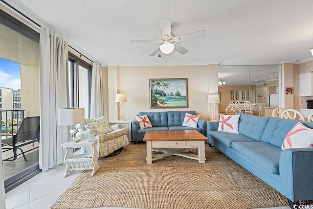 341 S Dunes Dr Unit C-34, Pawleys Island, SC 29585 - living room with ceiling fan, a textured ceiling, ornamental molding, and light tile patterned flooring