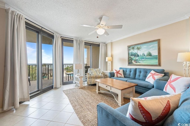 341 S Dunes Dr Unit C-34, Pawleys Island, SC 29585 - living area with a textured ceiling, ceiling fan, ornamental molding, and light tile patterned flooring