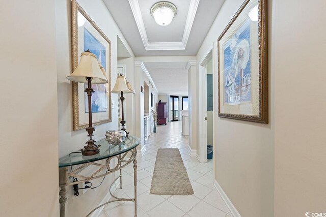 341 S Dunes Dr Unit C-34, Pawleys Island, SC 29585 - corridor with light tile patterned flooring, baseboards, a raised ceiling, and crown molding