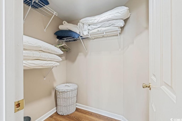 341 S Dunes Dr Unit C-34, Pawleys Island, SC 29585 - spacious closet featuring wood finished floors