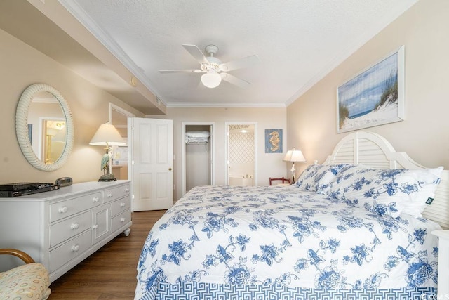 341 S Dunes Dr Unit C-34, Pawleys Island, SC 29585 - bedroom with dark wood finished floors, crown molding, ceiling fan, and ensuite bath
