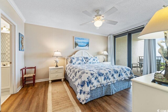 341 S Dunes Dr Unit C-34, Pawleys Island, SC 29585 - bedroom featuring wood finished floors, access to outside, crown molding, a textured ceiling, and baseboards