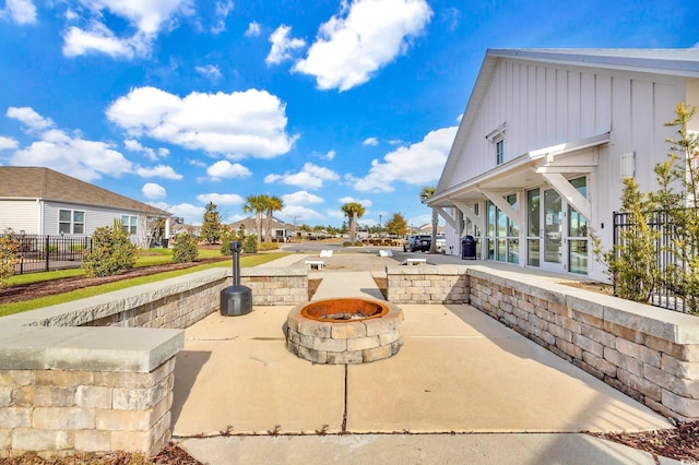 2653 Orion Loop, Myrtle Beach, SC 29577 - view of patio / terrace with an outdoor fire pit and a residential view